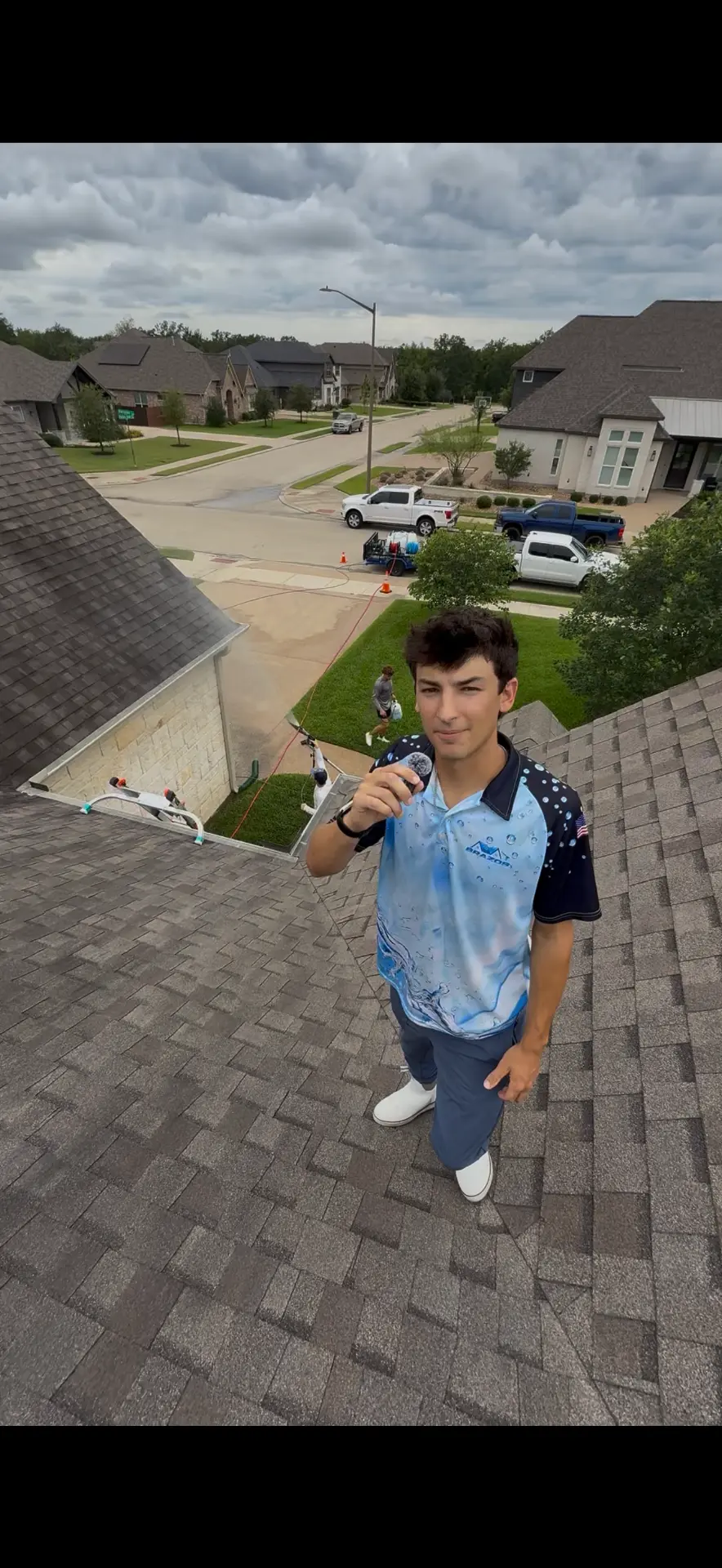 Kohlten Parlari on a roof wearing a Brazos Pro Wash shirt